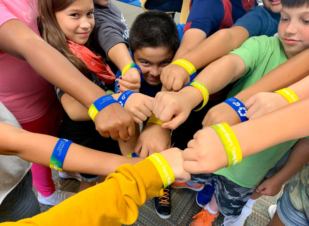 A group of students with wristbands.